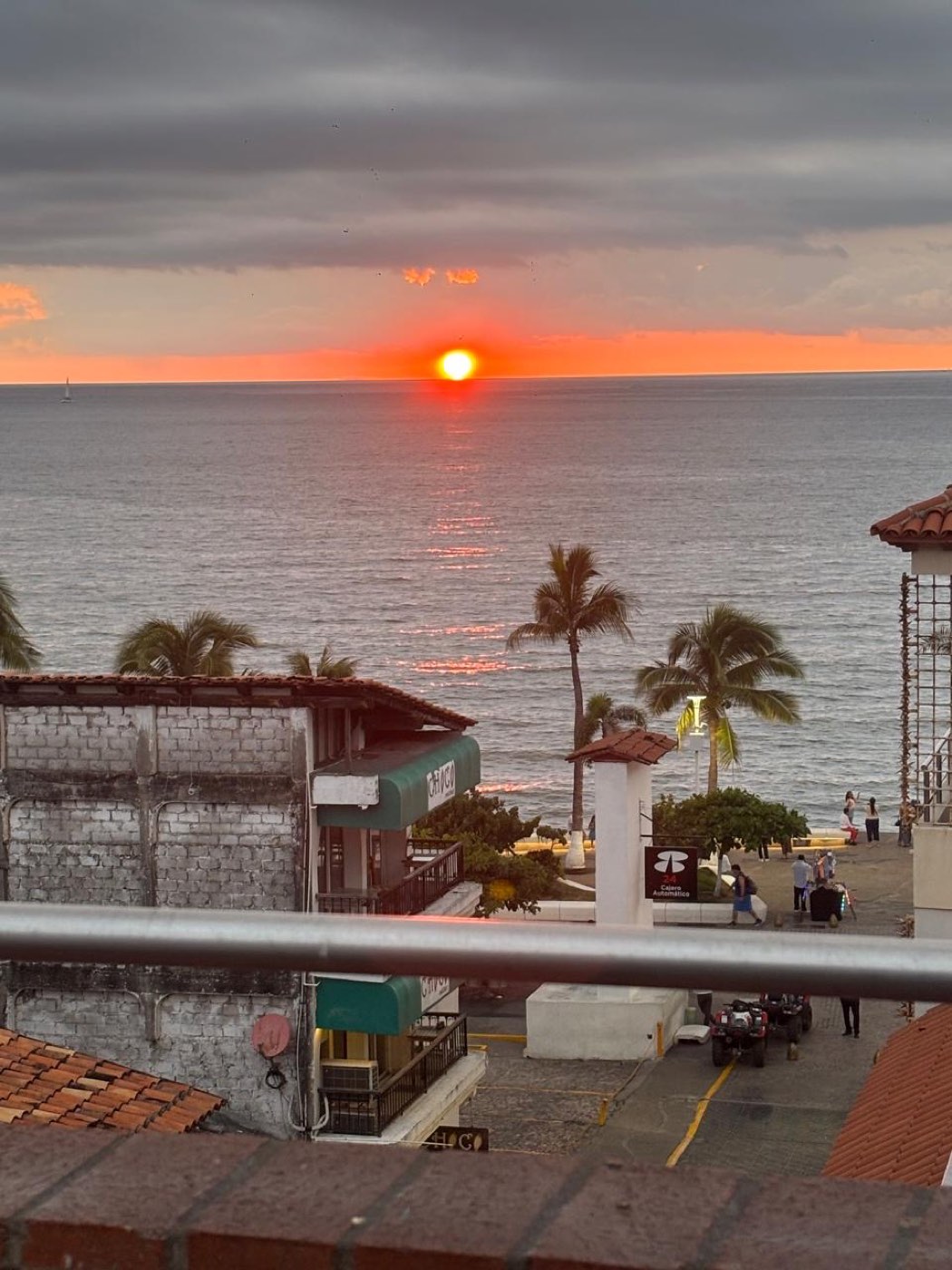 Sunset over the ocean from the Casa Santini rooftop